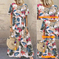 Maxikleid mit Retro-Blumenmuster 🌼 Rundhalsausschnitt, kurze Ärmel, locker und fließend – damit siehst du aus, als wärst du direkt aus einem Garten entsprungen 🌿
